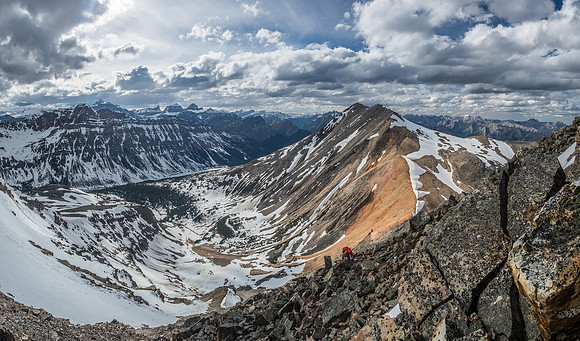 We are nearing the summit here, grunting up the last few loose boulders before the top.