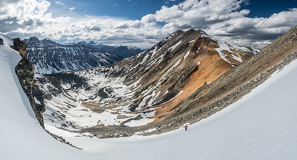 Looking back at Mike and Landslide Peak from the shallow couloir. Mount Hensley at left.