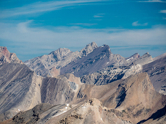 The crumbling massif of Recondite rises over Augusta to the north.