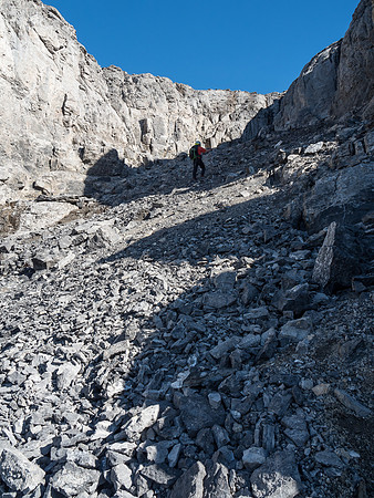 Phil starts up the obvious break in the summit block - this route has a low 5th section at the top.
