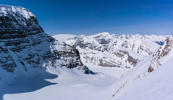 Looking north off the steep snow slope to the AA col. Our tracks just visible at bottom center. Andromeda looming across the AA Glacier at left.