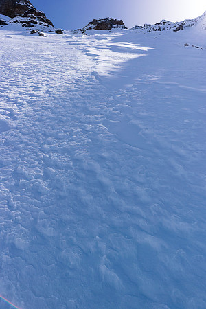 Looking up at the rock bands above our route. We easily broke through them on good snow.