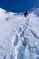 Ferenc continues to break trail for a while as we get higher up the west face beneath the AA col.