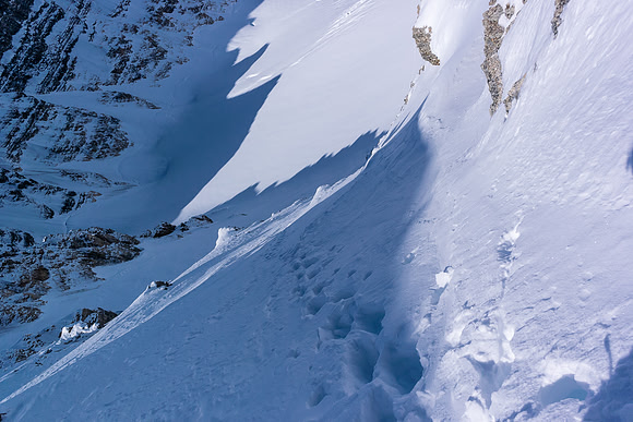 At the col.
