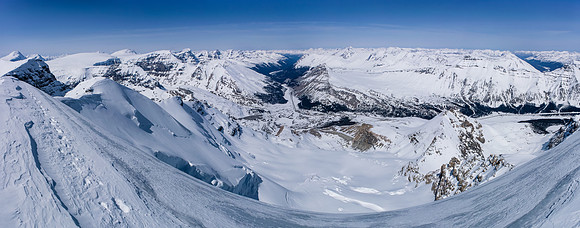A steep pano looking off the summit of Athabasca over Boundary Peak, down the North Glacier to the Icefields Center and Mount Wilcox