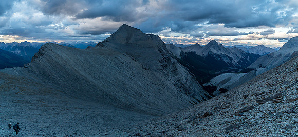 Descending under Mount Folk in fading light.