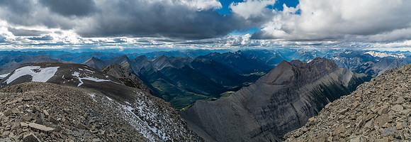 Looking west is a bit grimmer as the clouds are rolling in. Still lots of unnamed and fairly high peaks, especially at center - this is all part of the Quinn Range.