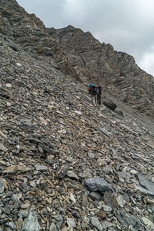 Now we're headed for an obvious steep, loose gully up to the summit ridge on the SE face.