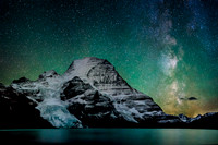 Waffl, Helmet, the Berg Glacier and Mount Robson with the Milky way above.