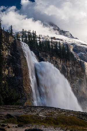 An amazing scene of power and beauty. Emperor Falls with the lower part of Robson's Emperor Ridge towering in the swirling clouds above.