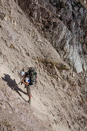 Ben is stuck! He had to balance there while a rope was lowered - even braving a rock fall event caused by the guys getting into position to help him!