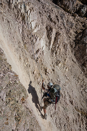 Ben is stuck! He had to balance there while a rope was lowered - even braving a rock fall event caused by the guys getting into position to help him!