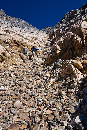In the lower, loose gully.