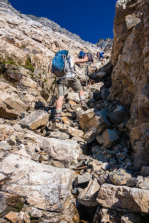 In the lower, loose gully.