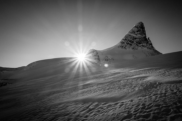 Sunshine and St. Nicholas Peak as we skin the headwall.