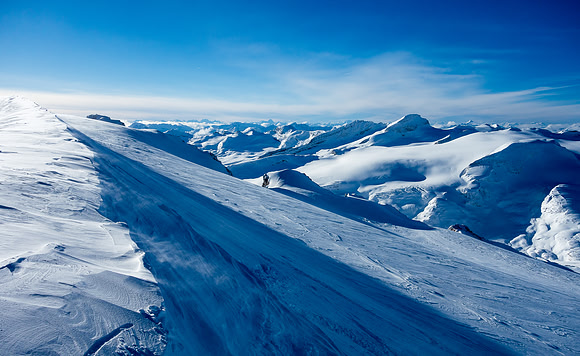 Looking off the summit ridge just before dropping into the descent - Mont Des Poilus to the west.