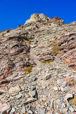 Looking up the terrain I scrambled - loose rock means you should wear a brain bucket here.
