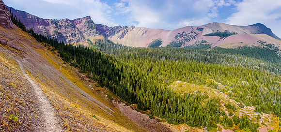 The trail continues to snake along on the east side of the ridge above Pincher Creek - staying above tree line as long as possible.