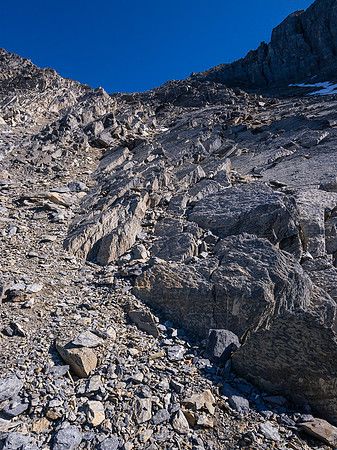 The terrain is horribly loose, the higher you go. It was likely covered by ice a short while ago and gets rearranged by avalanches each winter.