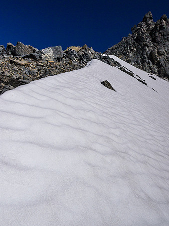 Avoiding scree and slabs by taking snow.