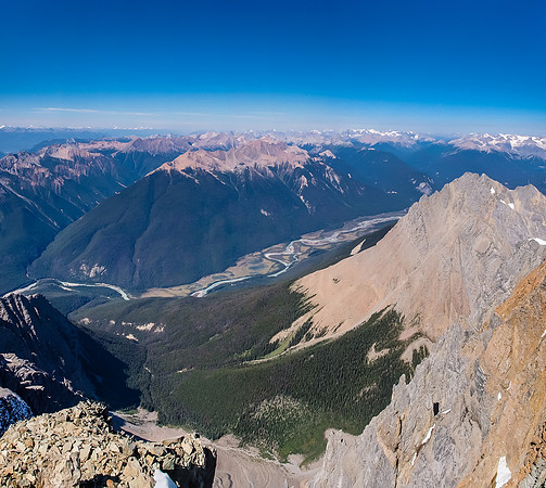 That is a LONG way down! Looking 2000 meters north off the summit, down to the Kicking Horse River with Mount Hurd well below me on the right.