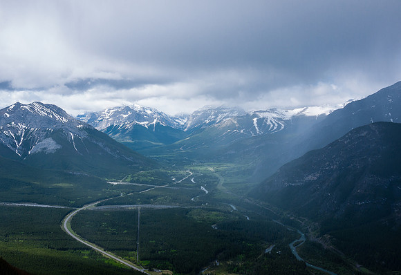 Rain to the south - note the snow on Nakiska's ski runs in the distance.