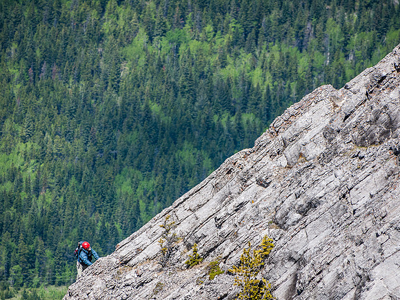 Greg continues up the crux.