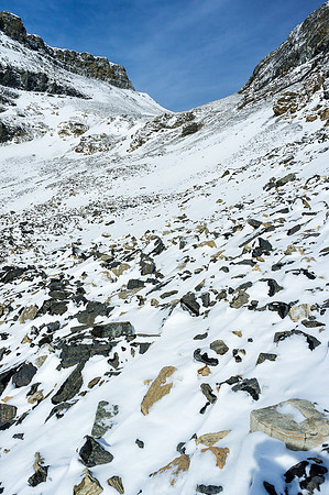 Scree slope to the col - summit out of sight to the right.