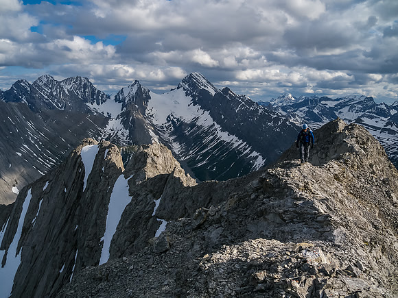 Keith takes the final few steps to the summit - incredible views!