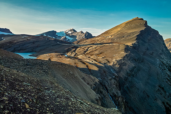 Looking back at Caldron Lake (L) and Peak (R) as we traverse back to the Peyto Glacier moraine.