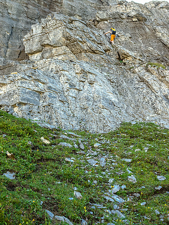Rather than side-hilling too far to climber's right, you can find your way straight up through the lower cliff band above the gully.