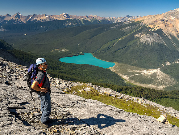 Taking a break after the first cliff band, Emerald Lake far below and Carnarvon rising out of sight at upper right.