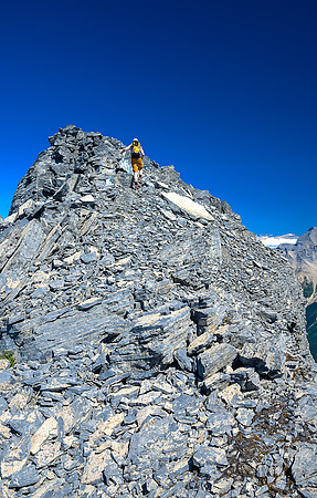 JW leads up the summit ridge. As you can see - it was a scorchingly hot day.