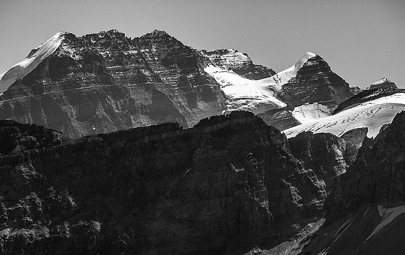 Distant Lake Louise giants include Huber, Victoria and Victoria North (R to L).