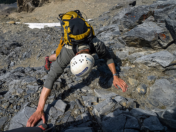 JW starts the tricky down climb - lots of VERY loose rocks!