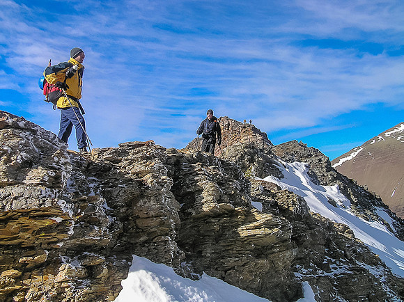 James and Kelly on the ridge with two guys coming down behind them.