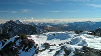 Eric traverses over to the summit of Buchanan Ridge.