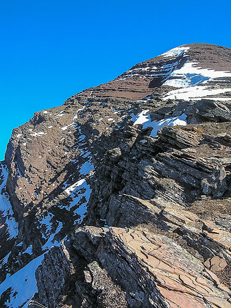 The route up the easy northwest ridge to the summit of Carthew as seen from the end of the traverse below the second cliff band.