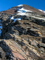 The route up the easy northwest ridge to the summit of Carthew as seen from the end of the traverse below the second cliff band.
