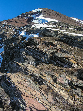 The route up the easy northwest ridge to the summit of Carthew as seen from the end of the traverse below the second cliff band.