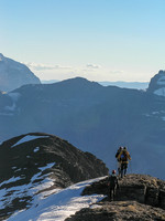 The group descends off the summit of Mount Carthew.