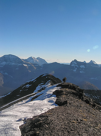The group descends off the summit of Mount Carthew.