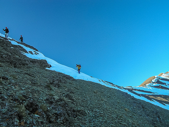 The group descends off  of Mount Carthew.