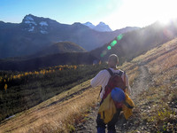 The setting sun puts the glare on us as we trudge back to the Cameron Lake parking lot.
