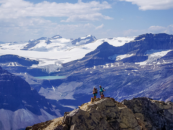 Looking back over the slightly lower false summit to Iceberg Lake, Collie and des Poilus.