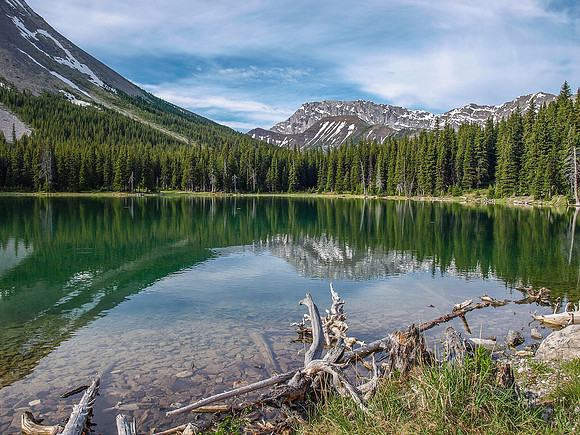 Beautiful Elbow Lake is still in the morning calm.