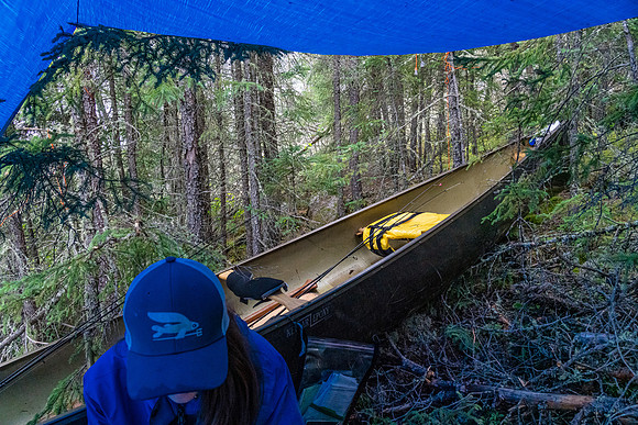 Bailing onto shore during a thunderstorm on our way to Indian House Lake.