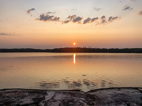 The sun rises over Haven Lake.
