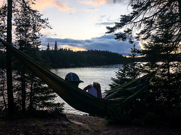 Evening reading at the deluxe Onnie Lake island campsite.