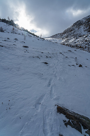 Hiking down from Packers Pass in snow.